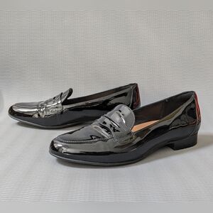 Unstructured by Clarks black patent loafers